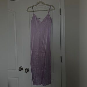 Satin Zara midi slip dress with open back with adjustable straps.